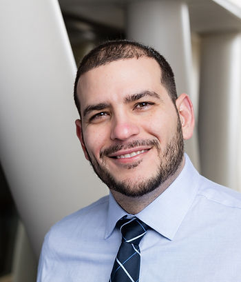 Dr. Lester Ferra, MD